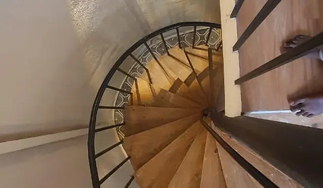 The spiral staircase inside the Little Red Cottage