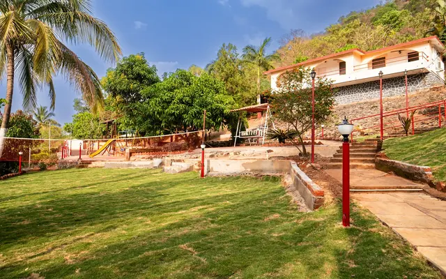 Lawn and garden path at Redroof Farmhouse