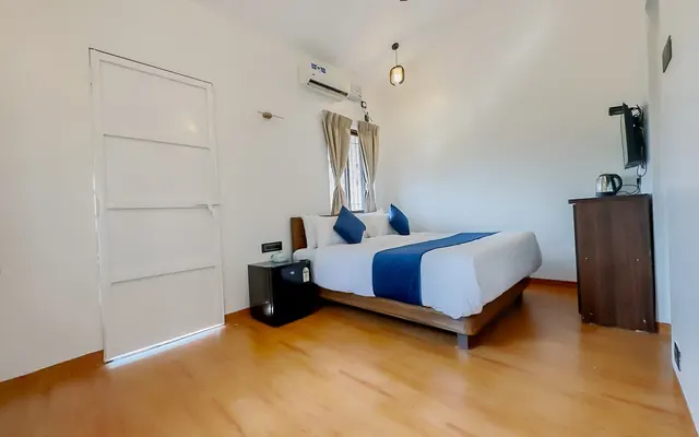 Bedroom at Redroof with a double bed and wooden floor